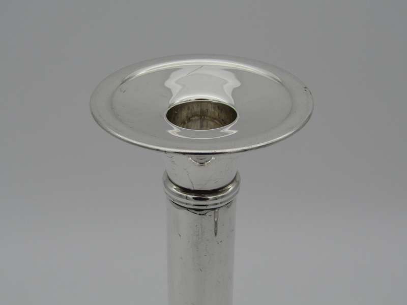 Pair of South African sterling silver candlesticks, made in 1994.