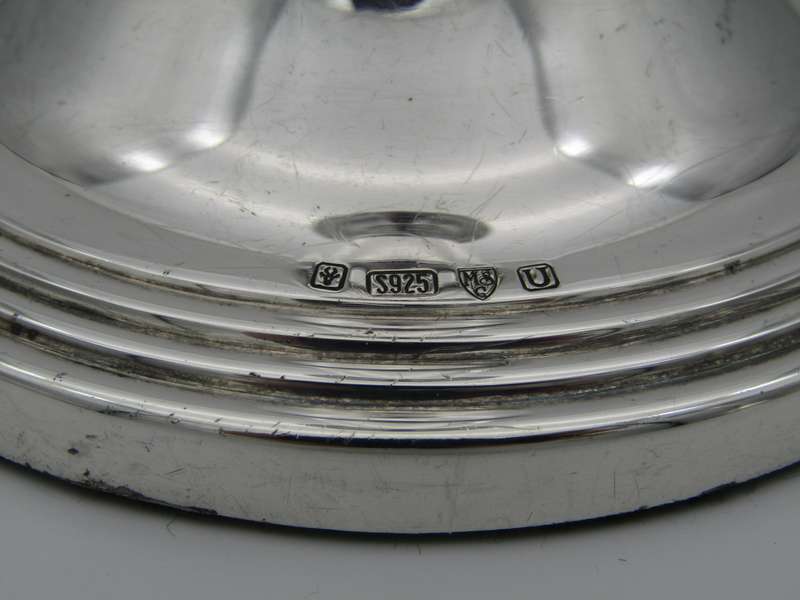 Pair of South African sterling silver candlesticks, made in 1994.