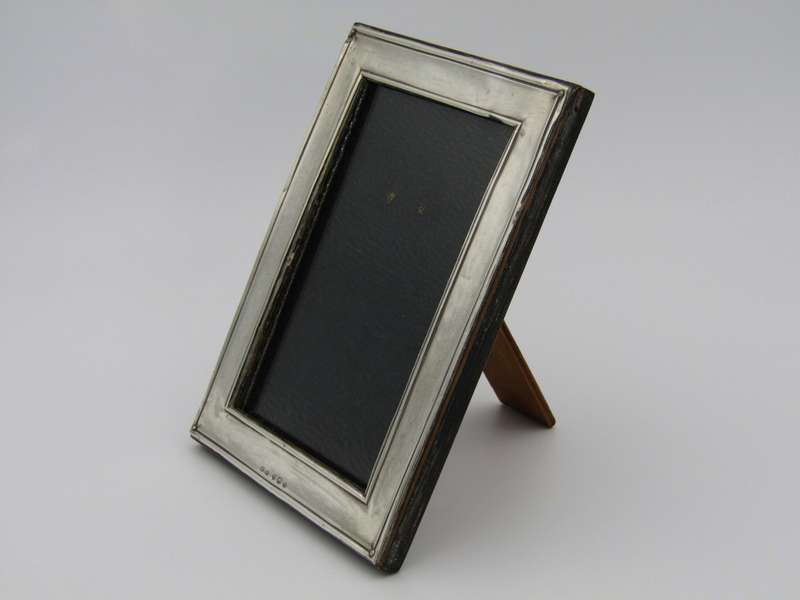 A sterling silver picture frame by Henry Williamson Ltd. Birmingham, 1912.