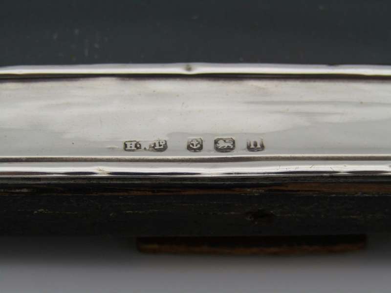 A sterling silver picture frame by Henry Williamson Ltd. Birmingham, 1912.