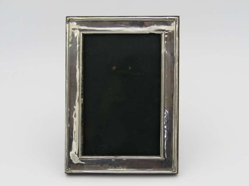 A sterling silver picture frame by Henry Williamson Ltd. Birmingham, 1912.