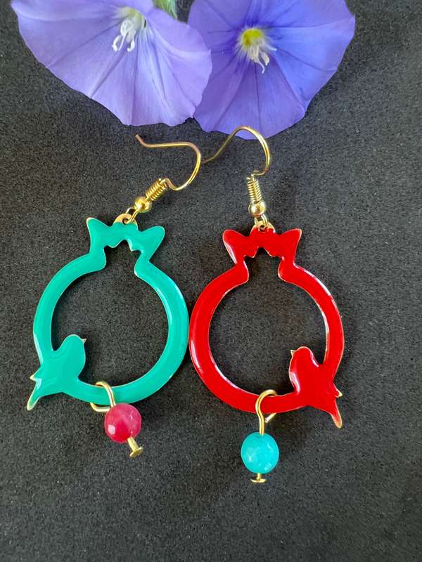 Finch and Pomegranate mismatched earrings