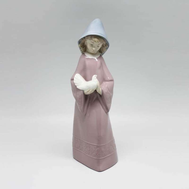 Nao Girl Holding Turtle Dove Figurine