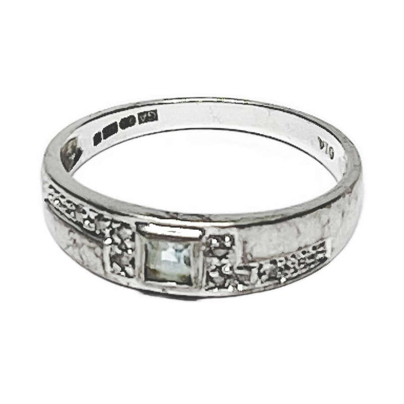 9 Carat White Gold Ring Set With A Precious Stone