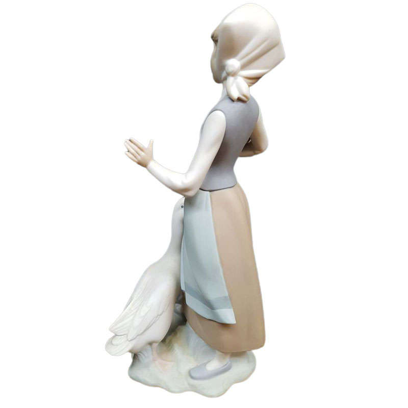 Lladro Girl Feeding Duck 1052
