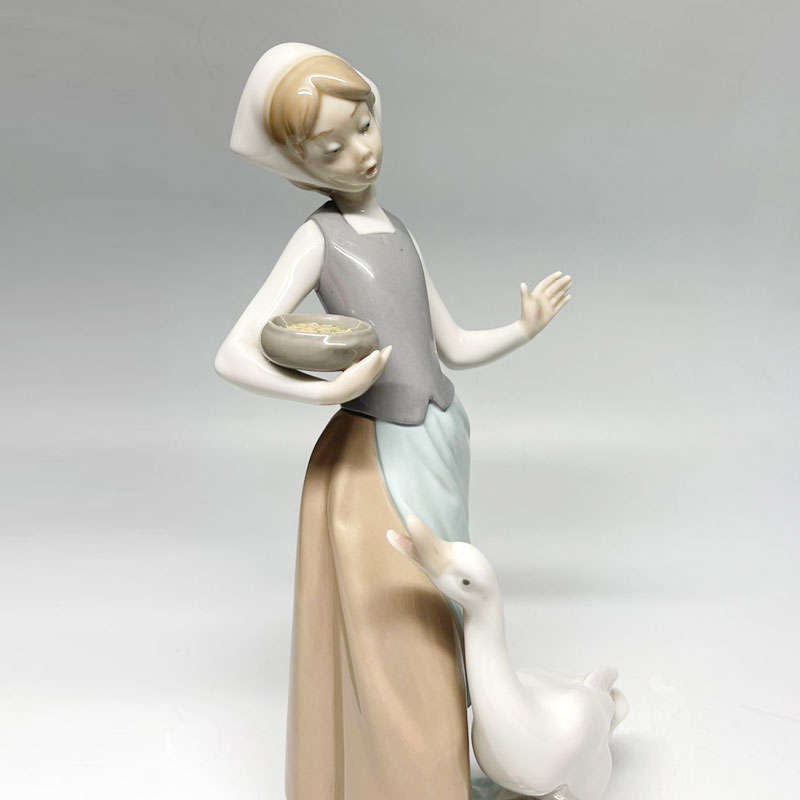 Lladro Girl Feeding Duck 1052