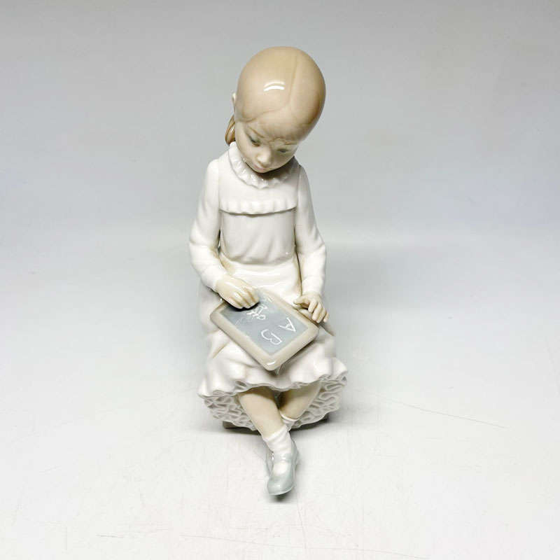 Nao By Lladro Girl Writing On Blackboard