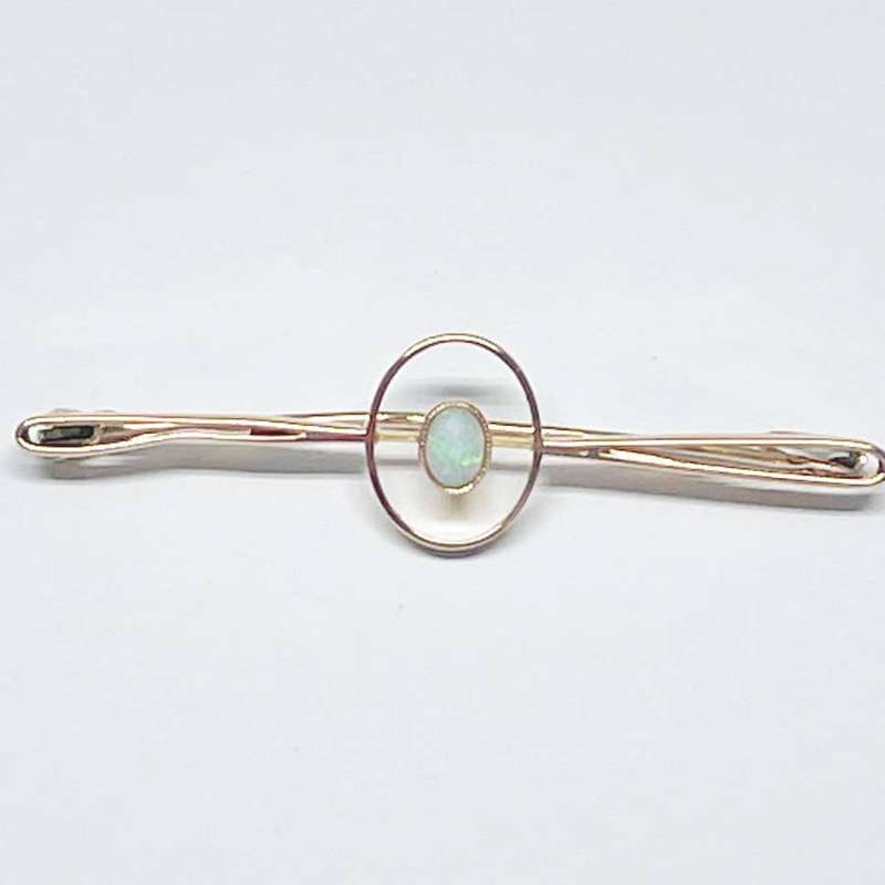 Opal 9ct Gold Bar Brooch Set In Gold Orb