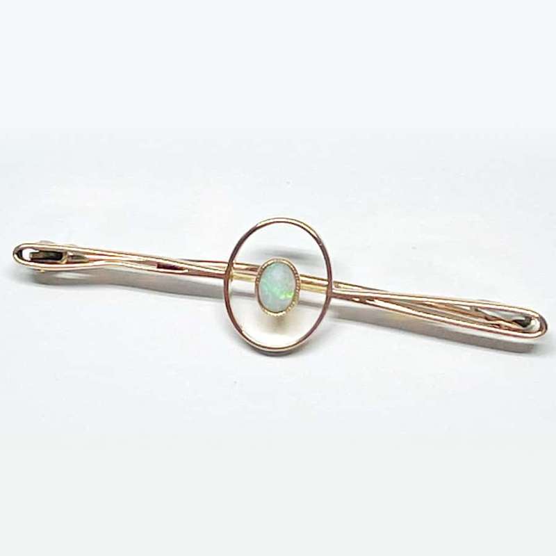 Opal 9ct Gold Bar Brooch Set In Gold Orb