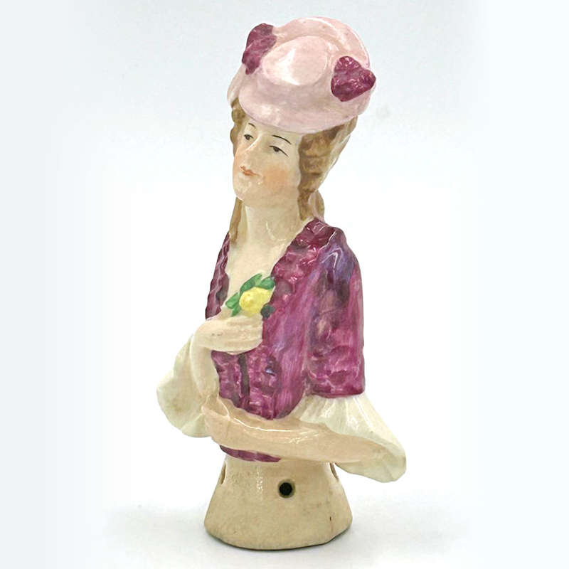 Porcelain Glazed 20th Century Half Doll Holding Yellow Flower