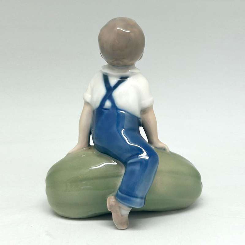 Royal Copenhagen Boy Sitting On Large Gourd 4539