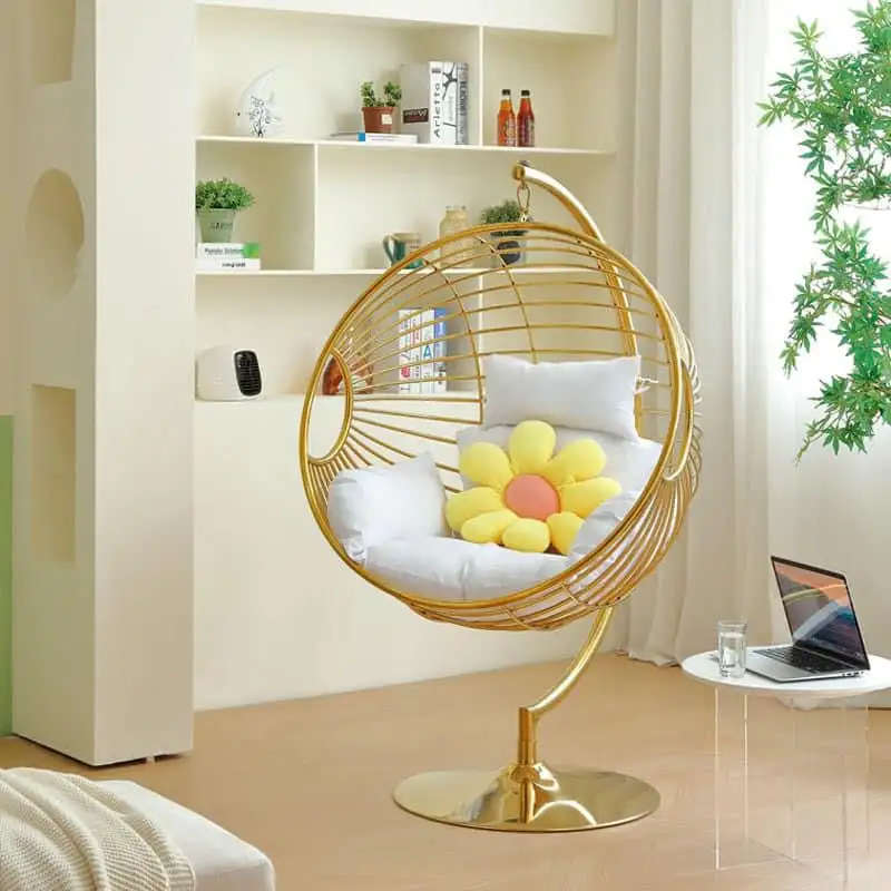 Gold swing chair with stand and cusions
