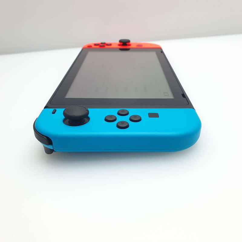 Nintendo Switch 32GB Black + Power Cable + HDMI Cable + 2 Joy-Con Controllers (3 Month Warranty) ...