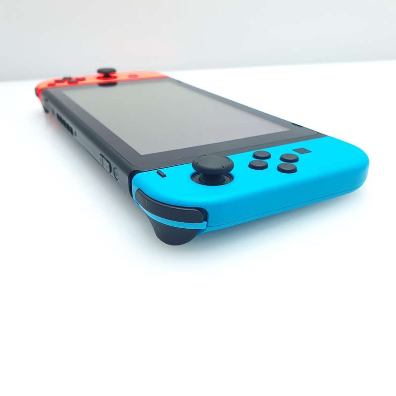 Nintendo Switch 32GB Black + Power Cable + HDMI Cable + 2 Joy-Con Controllers (3 Month Warranty) ...