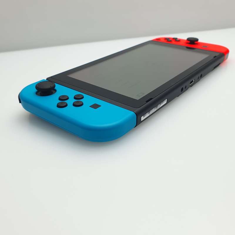 Nintendo Switch 32GB Black + Power Cable + HDMI Cable + 2 Joy-Con Controllers (3 Month Warranty) ...