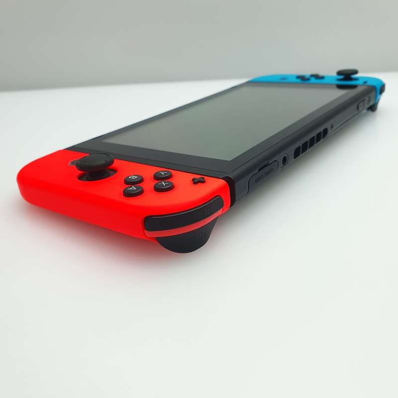 Nintendo Switch 32GB Black + Power Cable + HDMI Cable + 2 Joy-Con Controllers (3 Month Warranty) ...
