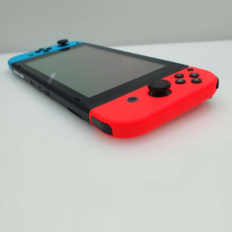 Nintendo Switch 32GB Black + Power Cable + HDMI Cable + 2 Joy-Con Controllers (3 Month Warranty) ...