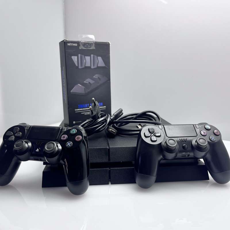 Playstation 4 1TB SSD Black 2 Controllers + Controller Charging Station + HDMI Cable + Power Cabl...