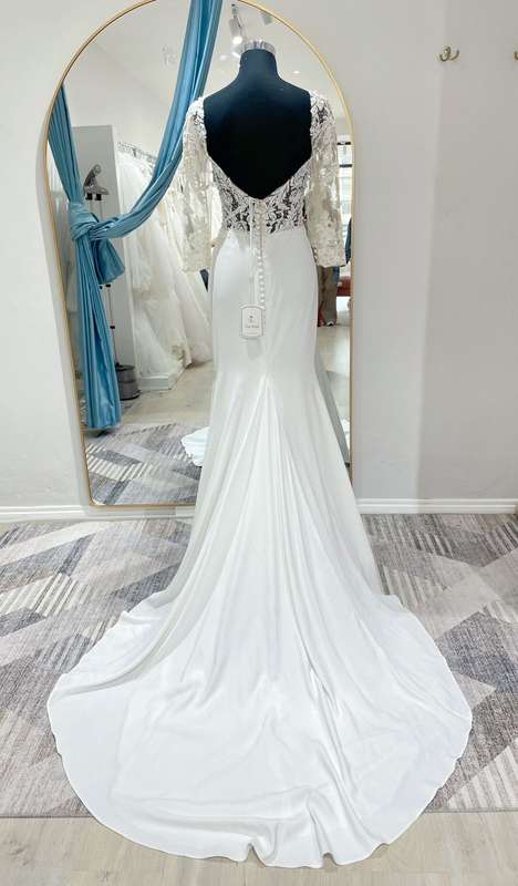 Tiara, Crepe Sheath with side slit , lace beaded bodice with sleeves.