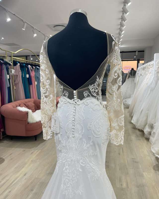 Logan , mermaid lace detail sleeves wedding dress.