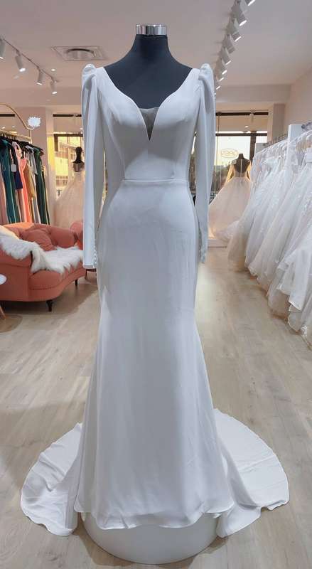Theressa, Long sleeve low back sheath wedding dress.