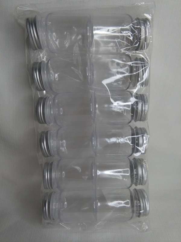 Round Plastic Bottle with Lid - 4x6cm each