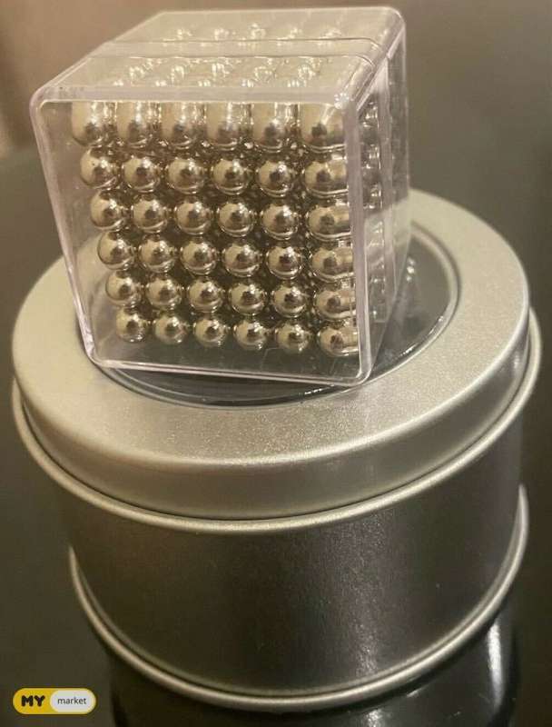 Magnetic balls in casing and box