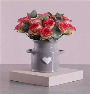 Pink Roses In A Ceramic Heart Jug
