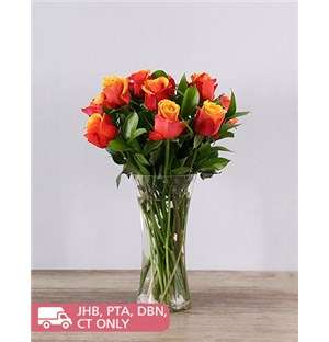 Cherry Brandy Roses in a Vase