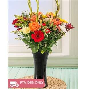 Mixed Flowers in a Tall Black Vase