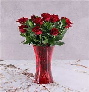 Red Roses in a Decorative Red Vase