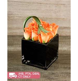 Orange Roses in Black Square Vase