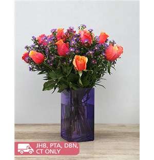Cherry Brandy Roses in Purple Vase