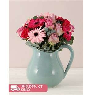 Flower Arrangement in a Vintage Pitcher
