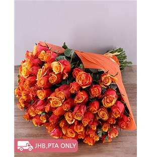 Cherry Brandy Roses In Orange Wrapping