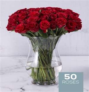 Red Roses in Hurricane Vase