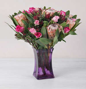 Roses and Protea in a Purple Square Vase