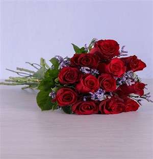 Red Roses Wrapped in Purple