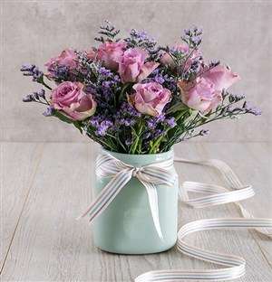 Lilac Roses in Mint Ceramic Vase