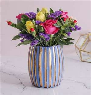 Elegant rose mix in stripe vase
