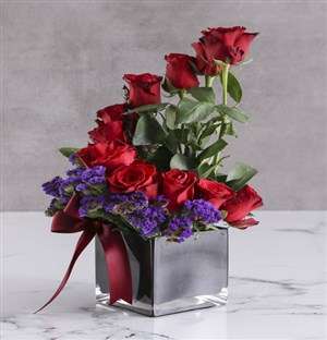 Red Roses In Black Square Vase