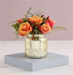 Cherry Brandy Roses in Glowing Vase