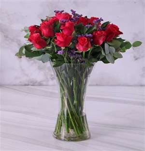 Cerise Roses In Clear Vase