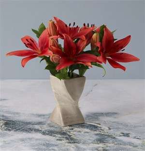 Lustrous Lilies In A Twisty Vase