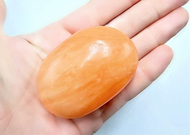 Orange Twist Calcite Palm Stone D (92g)
