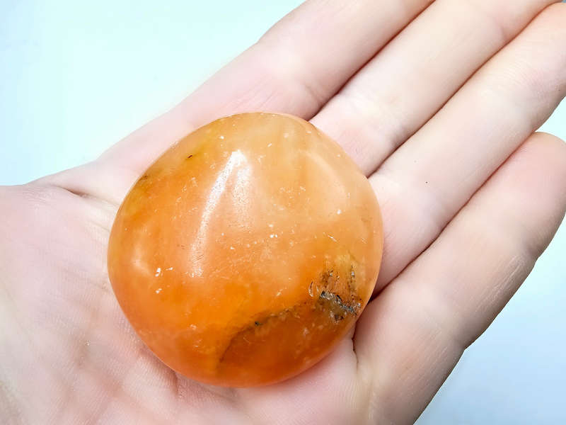 Orange Twist Calcite Palm Stone C (56g)