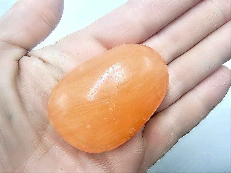 Orange Twist Calcite Palm Stone A (60g)