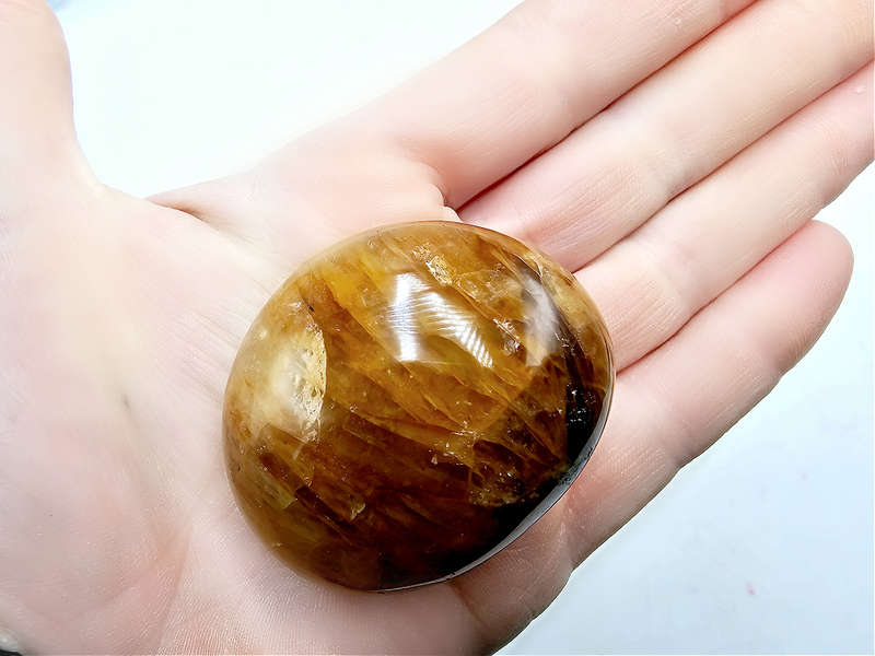 Hematoid Quartz Palm Stone (Golden Healer) D (96g)