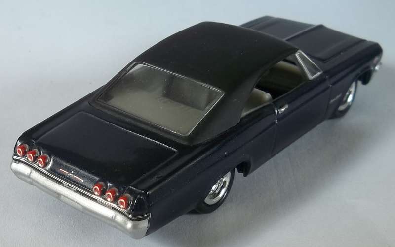 Johnny Lightning 1965 Chevrolet Impala similar scale to Matchbox car model