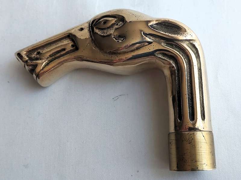 Vintage walking stick with brass crutch in shape of a horse's head